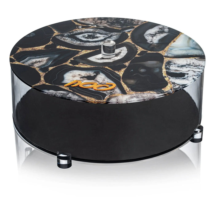 Black agate matzah box with natural stone patterns and gold accents, featuring a round base and decorative lid for Pesach.