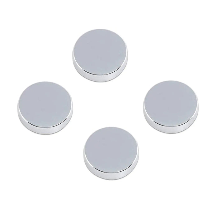 Four clear plastic dome caps with silver metallic bases arranged in a diamond pattern, Basic Screws hardware from Waterdale Collection.