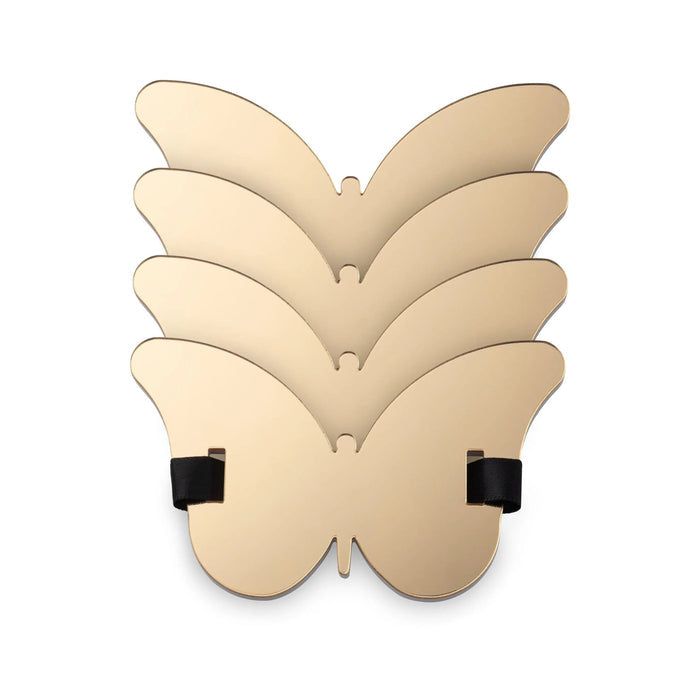 Cream butterfly napkin wrap with black accent details, folded wings design for elegant table setting by Waterdale Collection.