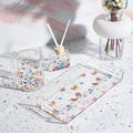 Butterfly Netilas Yadayim Set by Waterdale featuring clear acrylic cups with colorful butterfly designs and matching towel on marble surface