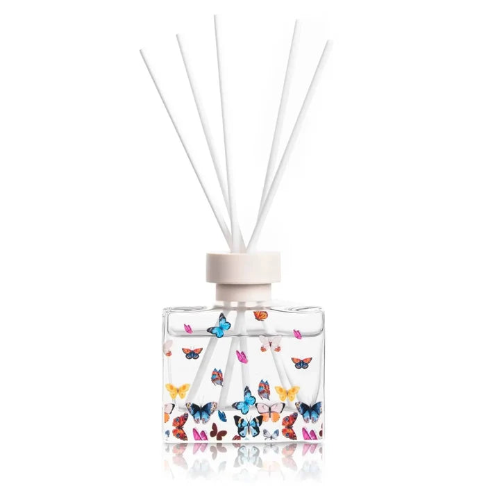 Butterfly Netilas Yadayim Set by Waterdale Collection with colorful butterfly design, glass bottle, and reed diffuser sticks.