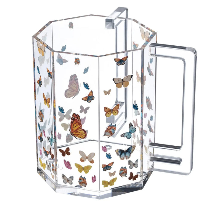 Clear acrylic washing cup featuring colorful butterflies in flight, perfect for Shabbat rituals and housewarming gifts from Waterdale Collection.