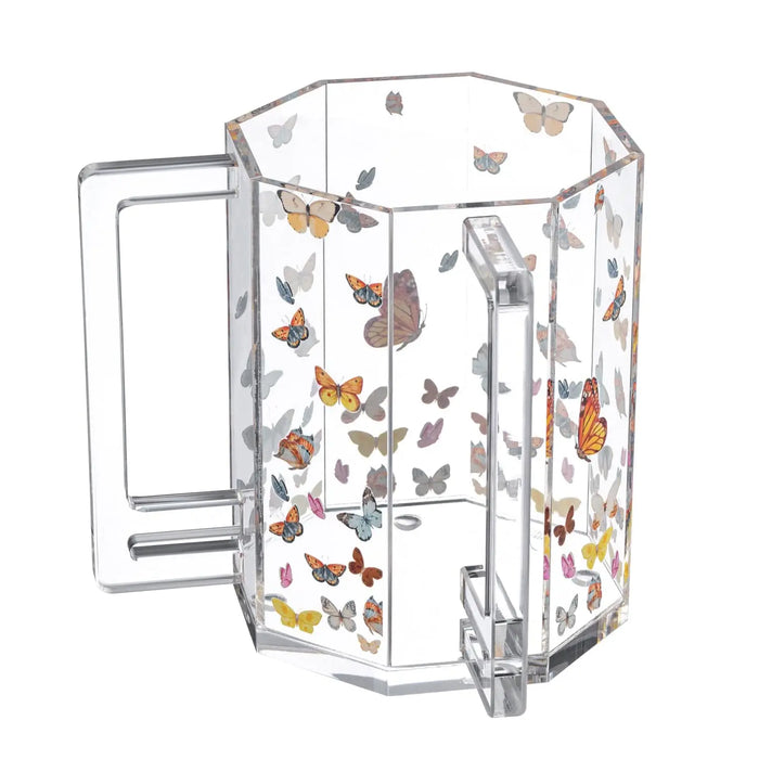 Butterfly Washing Cup from Waterdale Collection features a clear acrylic design with colorful butterfly and floral motifs throughout, complete with a matching handle.