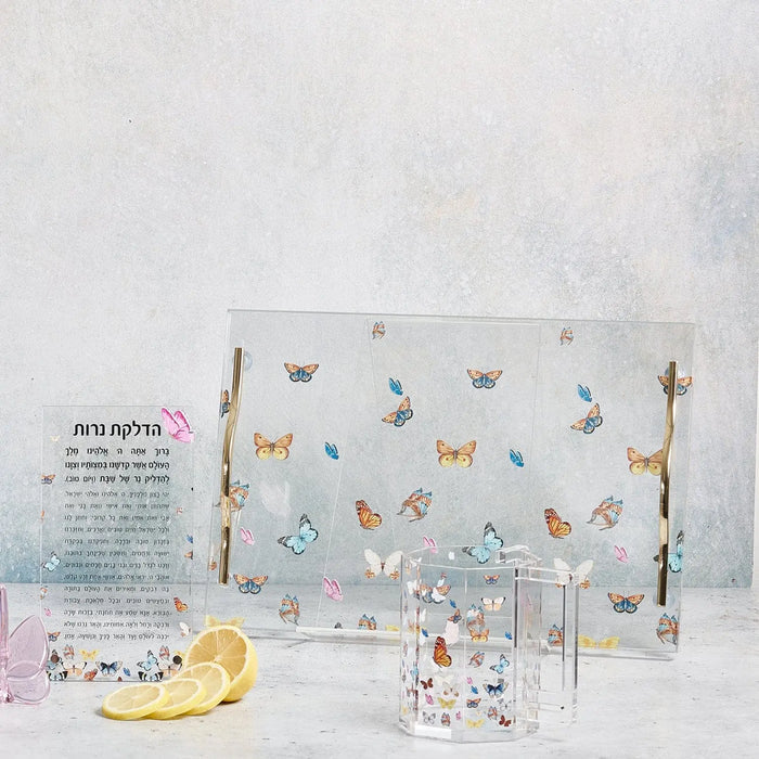 Waterdale Collection butterfly washing cup in soft blue with floral motifs, displayed with coordinating Jewish holiday gift items on white surface.