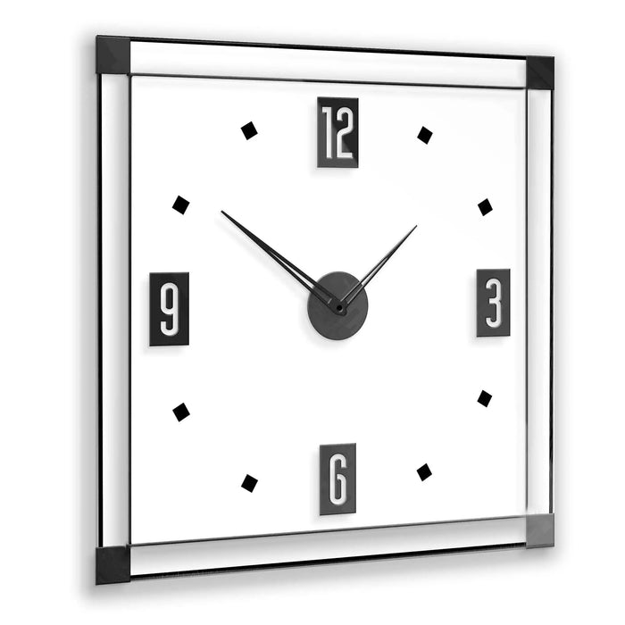 Classic 2.0 wall clock with black frame, white face, bold numbers at 12, 3, 6, and 9, diamond hour markers, and dark hands.