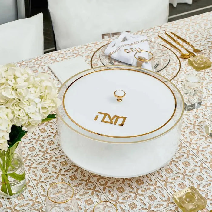 Classic 2.0 Matzah Box in white with gold accents, displayed on a decorative table setting for Pesach.
