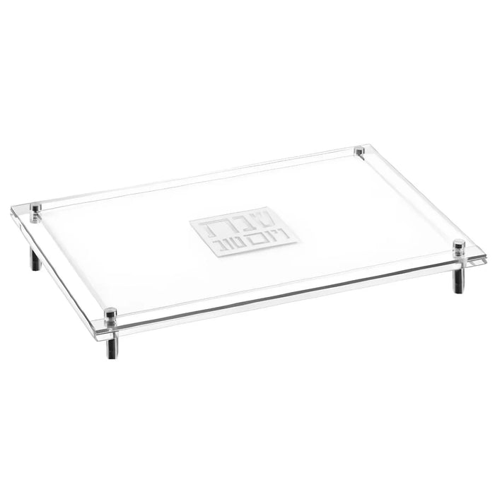 Classic 2.0 Raised Challah Board with clear glass top, metal frame, and four corner handles on legs, perfect for Shabbat table serving.