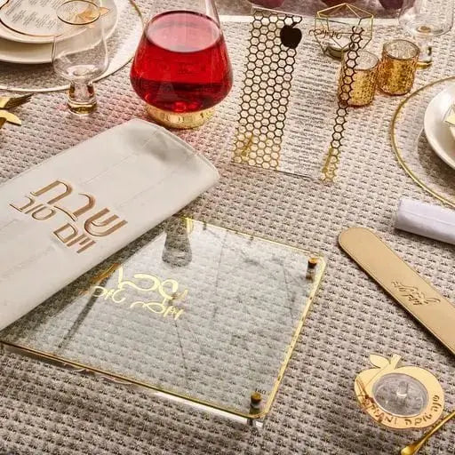Classic Challah Board by Waterdale Collection displayed on table setting with wine glasses and place settings for Shabbat dinner.