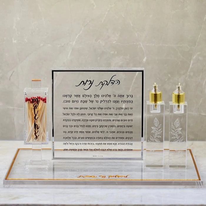 Classic Hadlokas Neiros block with marble base, gold candlesticks, prayer card, and flower arrangement for candle lighting ceremonies.