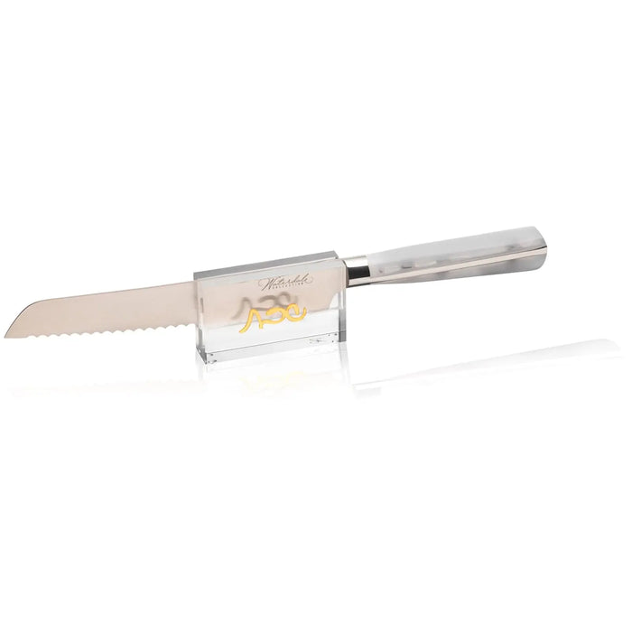 Classic silver knife stand with cream-colored challah board holder, featuring a sleek metal handle and modern tabletop design for Shabbat.