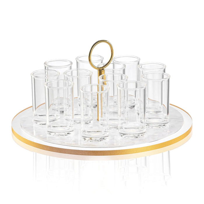 Classic Pearlstone liquor set featuring clear glass bottles and cups arranged on a pearl marble base with gold accents and decorative holder.