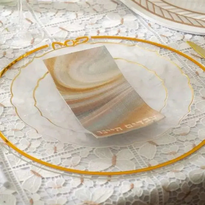 Classic Pesach Charger with gold border on white lace background, elegant lucite design for holiday tableware.