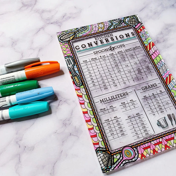 Color It Acrylic kitchen conversions magnet with measurement conversions chart, displayed with colorful markers on marble surface.