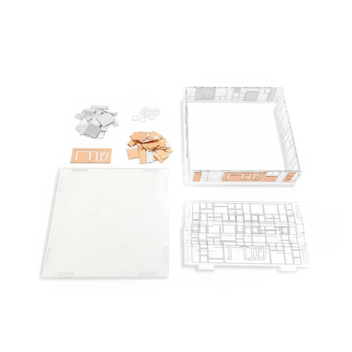 Color It Acrylic Mosaic Shabbos Napkin Holder unassembled with white acrylic pieces, colorful mosaic design elements, and instruction sheet for DIY assembly.