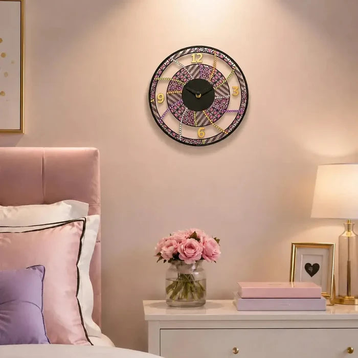Color It Acrylic Rhinestone Clock with decorative mosaic design on bedroom nightstand next to pink flowers and accessories.