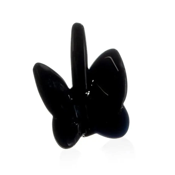 Black crystal butterfly ring holder with three curved petals, glossy finish, displayed against white background