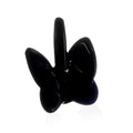 Black crystal butterfly ring holder with three curved petals, glossy finish, displayed against white background