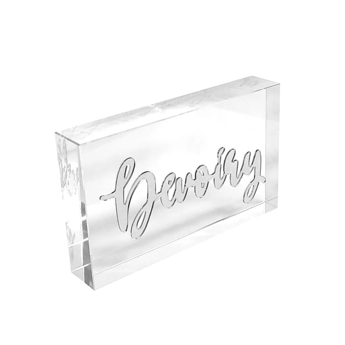 Clear acrylic custom place card with elegant script lettering for wedding table settings and events