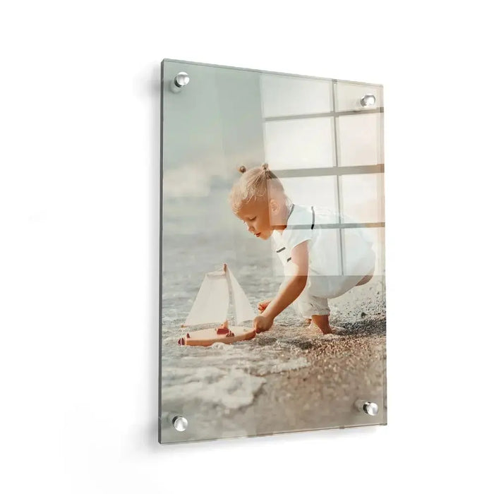 Framed custom print on white wall showing minimalist beach scene with neutral tones and geometric window grid design from Waterdale Collection.