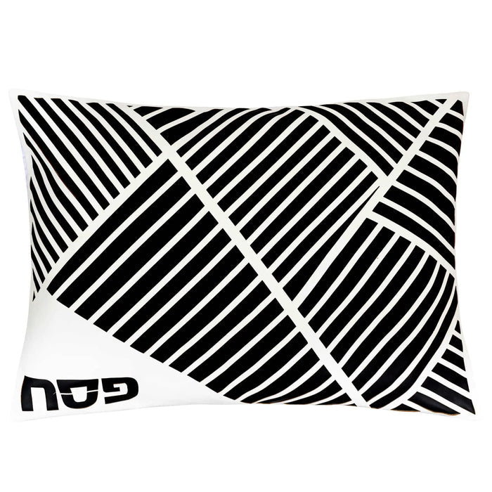 Black and white diagonal laser-cut leather Pesach set with geometric striped pattern design and Waterdale Collection branding visible.
