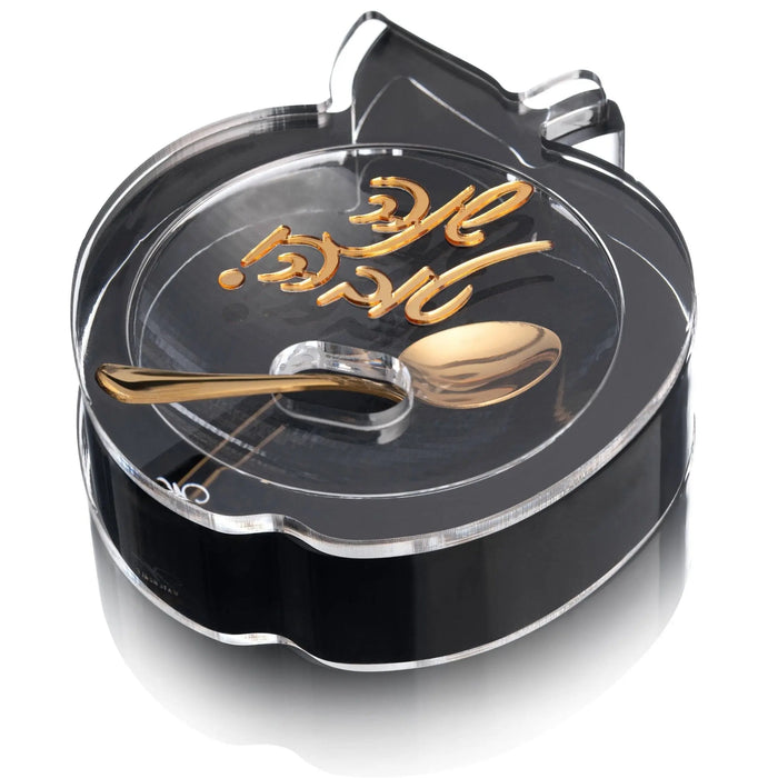 Black and gold apple honey dish with Shana Tova lettering for the Jewish New Year