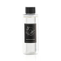 Clear glass diffuser refill bottle with black label from Waterdale Collection, featuring minimalist design and black cap closure.