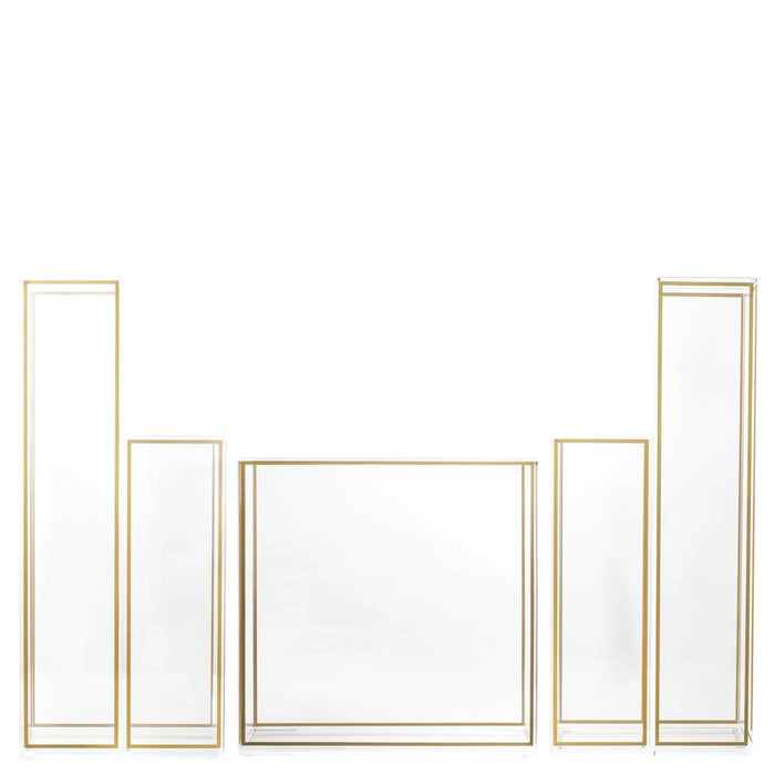 Five geometric vases with double outline frames in gold and silver finishes arranged in a minimalist display.