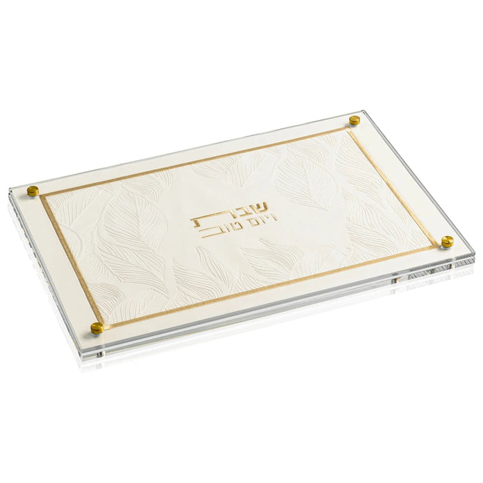 Embossed Leaf Challah Board with gold and silver metal corners on cream leather, elegant Shabbat serving piece from Waterdale Collection.