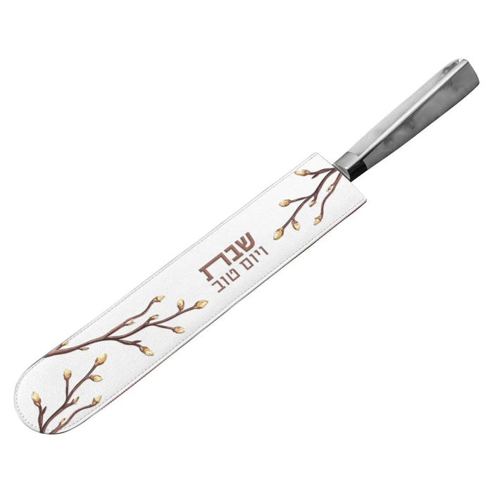 White leather knife blade cover with embroidered leaf design and gray metal ferrule by Waterdale Collection