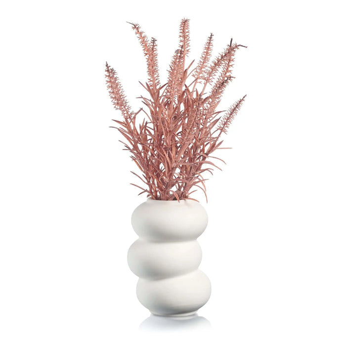 White stacked donut vase with dried mauve pampas grass arrangement, modern tabletop faux floral decor by Waterdale Collection.