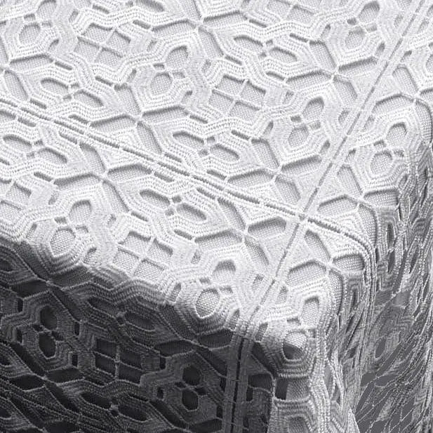 White filet crochet lace tablecloth featuring intricate geometric patterns and openwork design, perfect for Shabbat and holiday table settings.