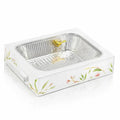 White floral bird ceramic pan holder with gold accents, featuring a ribbed aluminum insert and pearl marble finish base for serving dishes.
