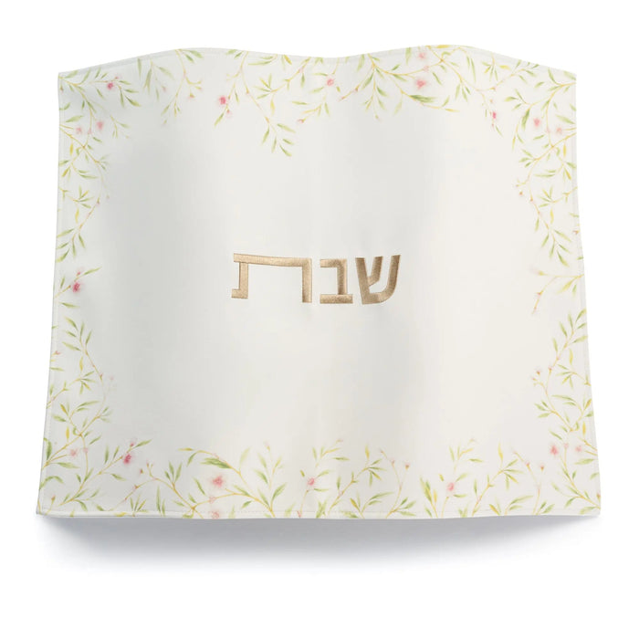 Floral Bird Challah Cover with cream fabric featuring delicate botanical and bird design border, embroidered Hebrew text center, suitable for Shabbat and holiday use.