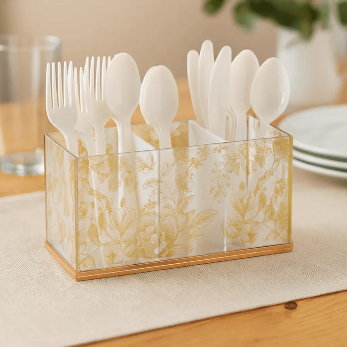 French Toile Silverware Caddy in cream with classic pattern holding white plastic utensils on wooden table