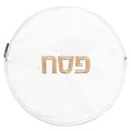 White circular Gebrokst Matzah Pouch with gold embroidered Hebrew text, Pesach tabletop storage.