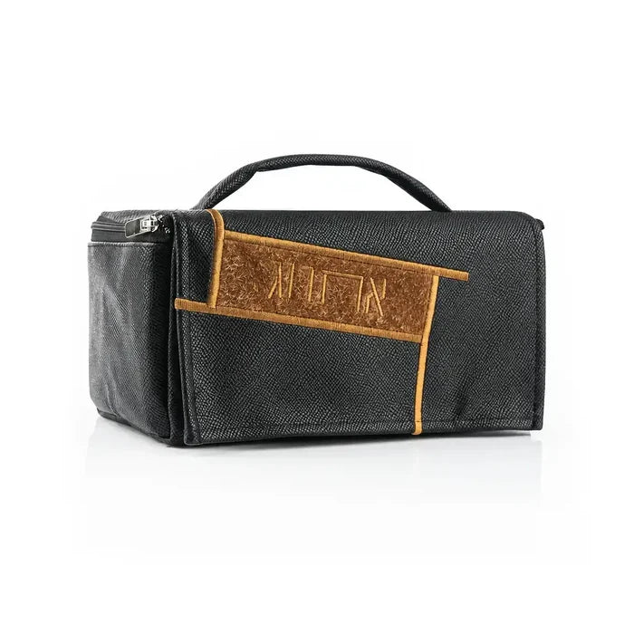 Black leather etrog bag from Waterdale Collection with tan fur panel and embossed Hebrew lettering.