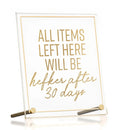 Gold-framed guest room sign with inspirational text and two writing pens, tabletop plaque by Waterdale Collection.