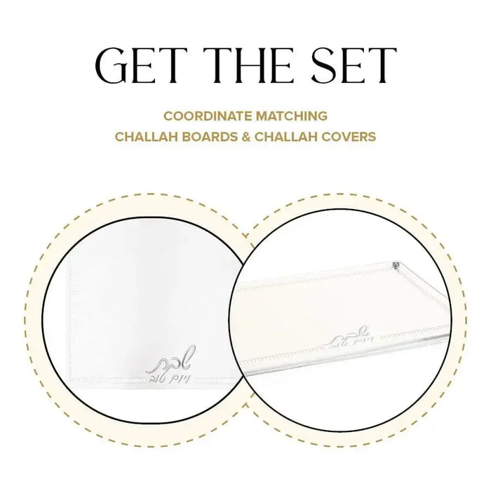 Hemstitch challah board set with two round white trays featuring delicate embroidered borders, displayed as a matching pair for Shabbat table settings.
