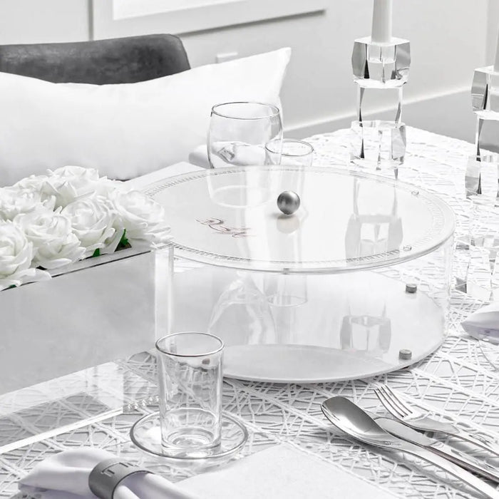 Hemstitch Matzah Box with clear lucite construction displayed on white table setting with flowers and glassware for Passover.