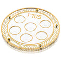 Herringbone Seder plate with six compartments arranged in circle, featuring woven pattern border and gold accents on clear lucite base.