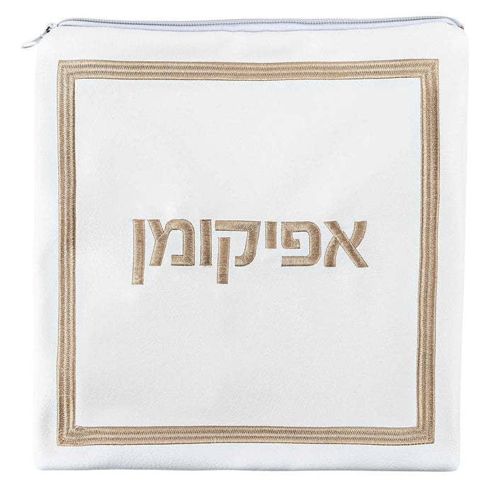 White leather afikoman bag with gold trim and Hebrew text, elegant hotel-style design for Passover