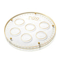 Waterdale Collection's clear lucite Seder plate with gold trim and seven circular wells for Passover traditional foods.