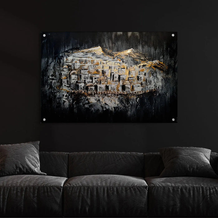 Jerusalem Hills of Gold painting displayed above a dark gray sofa, featuring warm golden tones and textured brushwork depicting the historic landscape.
