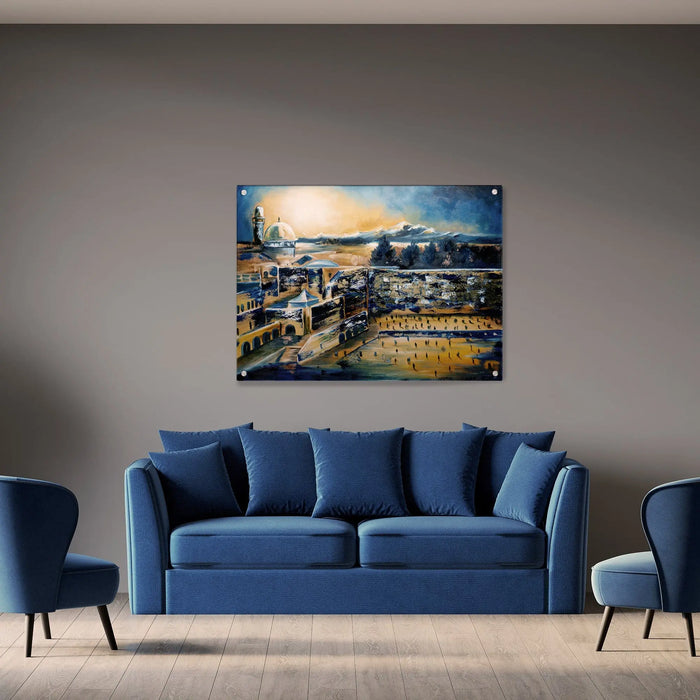 Kosel Plaza Deep Night painting displayed above a blue sofa in a modern living room with accent chairs, showing Jerusalem artwork in warm and cool tones.