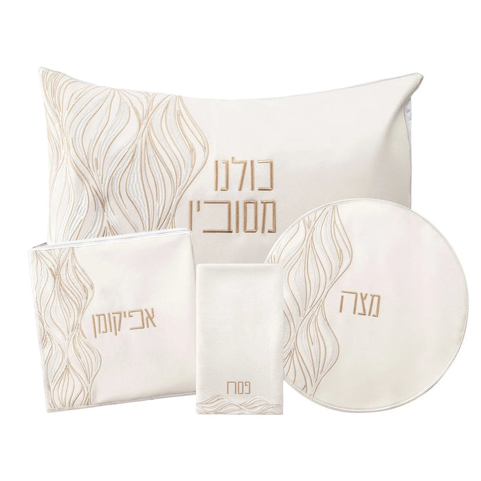 Lace Pesach set in gold and white featuring matching tabletop items and leather accents from Waterdale Collection