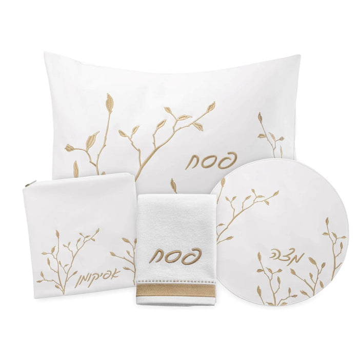 Leaf Pesach Set by Waterdale Collection featuring white and gold ceramic dishes with botanical leaf designs, displayed with matching tabletop pieces.