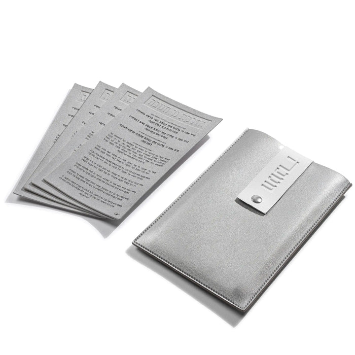 Silver and white Chanukah Brachos Card Set, four cards fanned beside the leather pouch for Hanukkah lighting