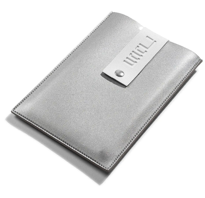 Silver leather pouch with the Chanukah brachos cards tucked inside, a compact set for the Chanukah table