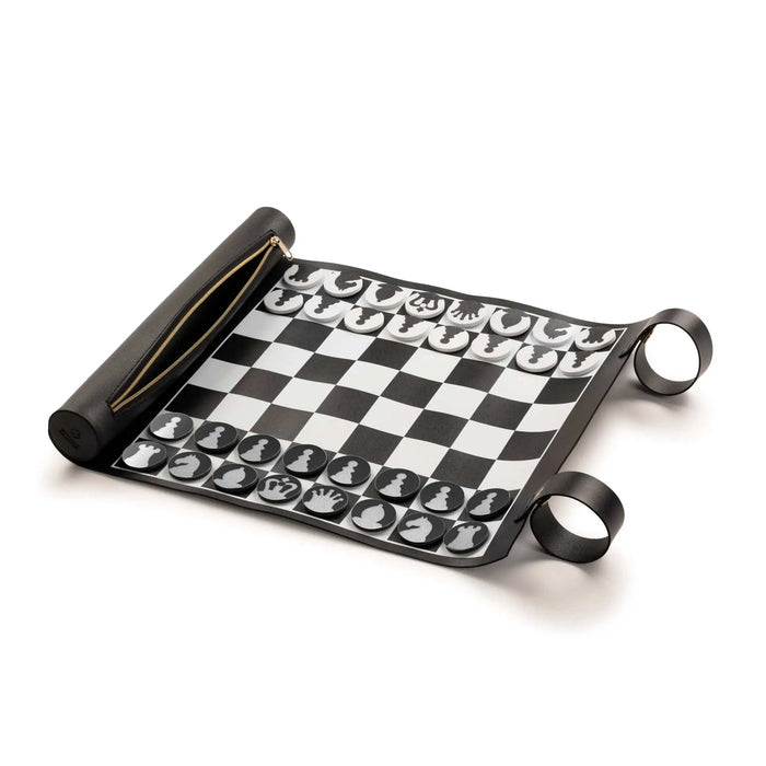 Rolled black and white leather chess and checkers set with game pieces and storage ring, compact travel board game by Waterdale Collection.