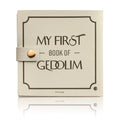 Tan leather kids Gedolim book with decorative corner designs and gold clasp closure, featuring "My First Book of Gedolim" text on cover.